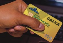 Entenda o significado e como resolver a mensagem “Pagamento Bloqueado: Crédito em Conta” ao tentar sacar o Bolsa Família.