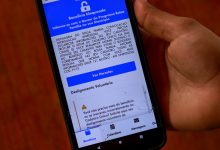 Mensagem de bloqueio do Bolsa Família no app.